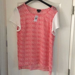 Red pattern short sleeve shirt with white sleeves.